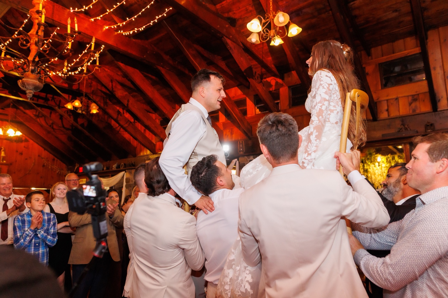 Wedding guests celebrating on the dance floor