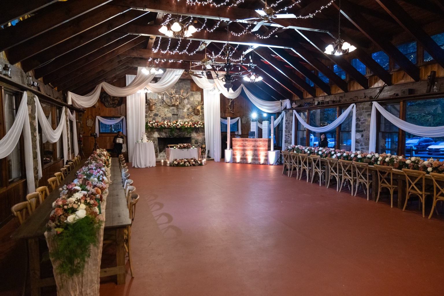 Stone fireplace and wedding reception setup